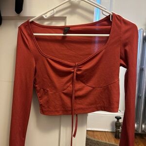 Small red crop top tie in the front